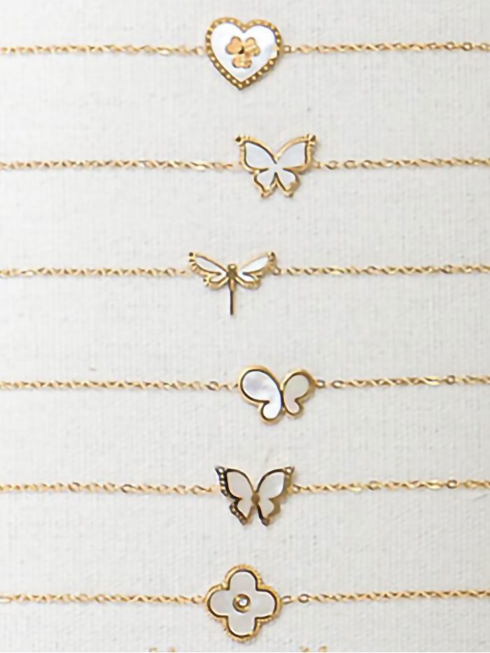 Conjunto de 12 pulseras con colgantes de nácar - Expositor incluido