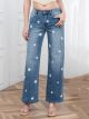 Jeans wide leg apliques de flores
