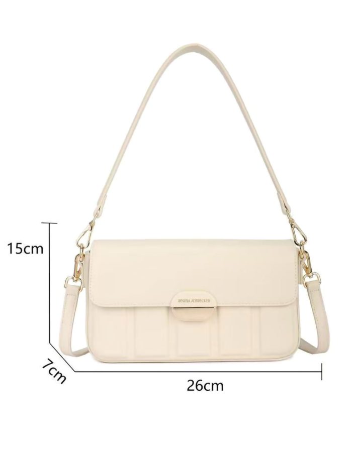 Bolso bandolera baguette con solapa y detalle acanalado