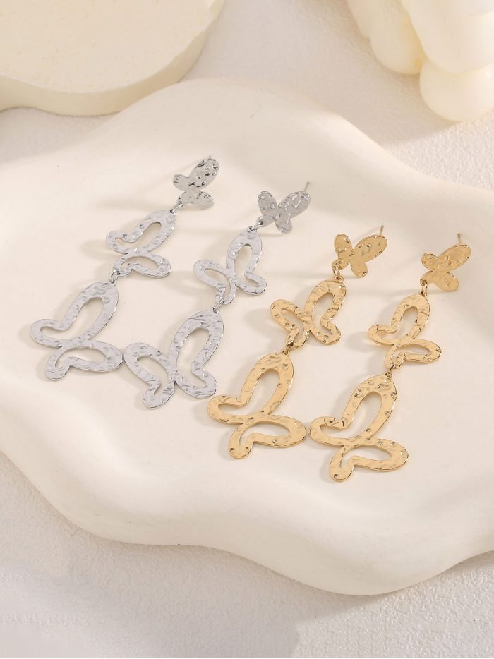 Lange Schmetterlings-Ohrringe mit Textur