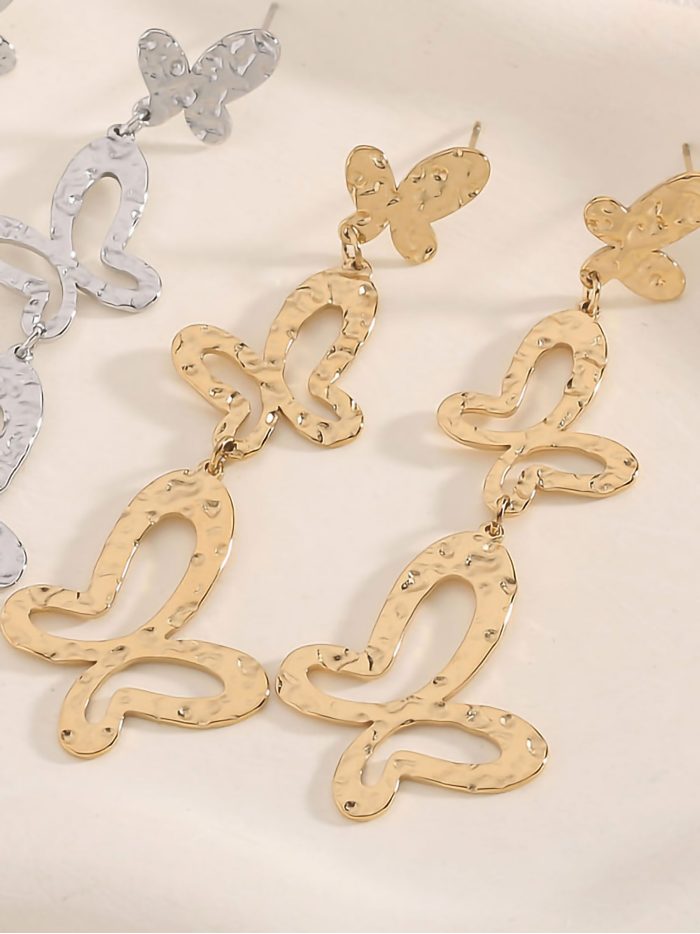 Lange Schmetterlings-Ohrringe mit Textur