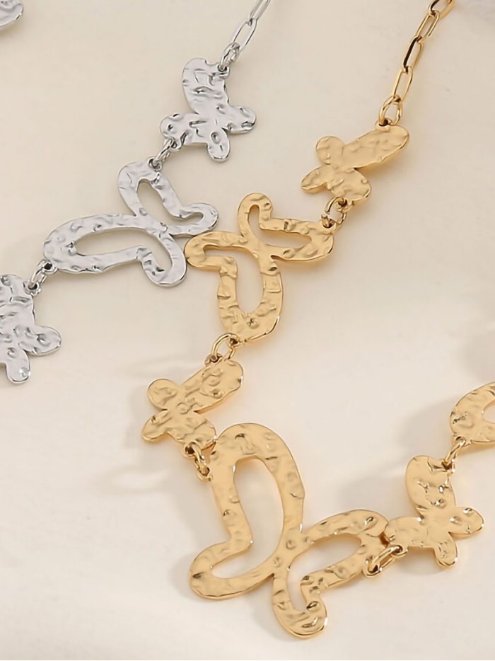 Collana pendente farfalle texture