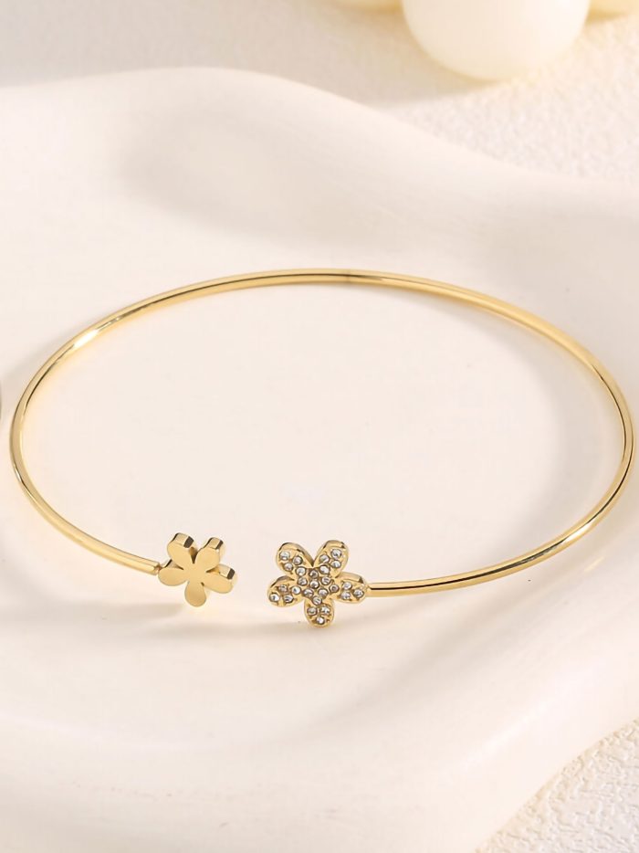 Pulsera rígida flor con circonitas