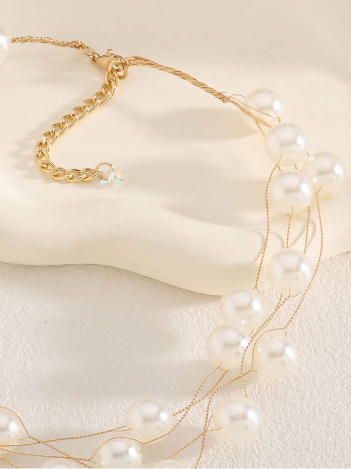 Collar multicapa con perlas