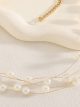Collar multicapa con perlas