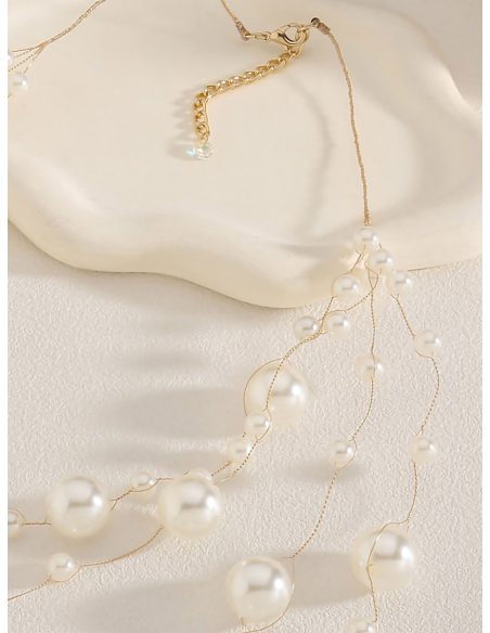 Collar multicapa con perlas