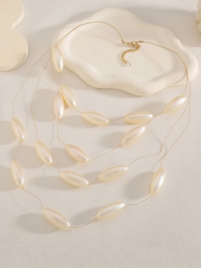 Collar multicapa con perlas