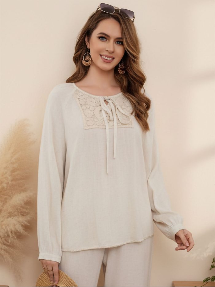 Linen blouse with tie neck and lace