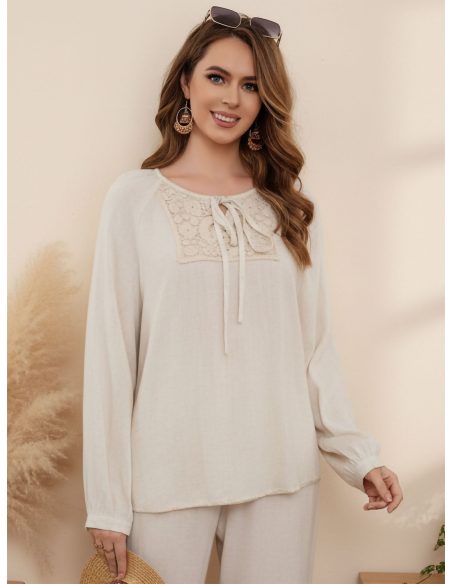 Linen blouse with tie neck and lace