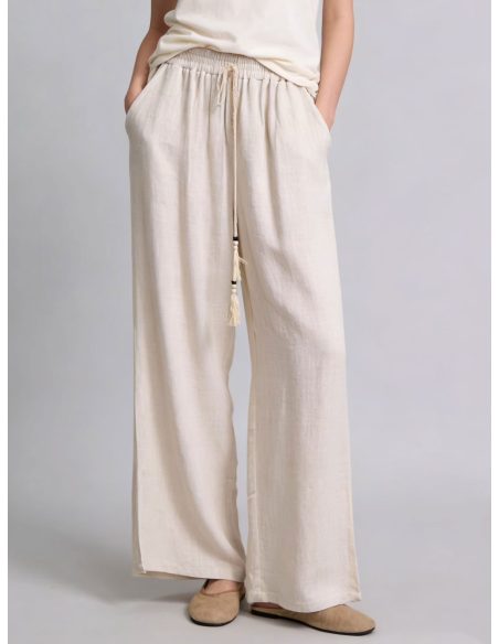 Pantaloni larghi in lino con coulisse e nappe
