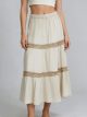 Falda midi lino volantes y pasamanería
