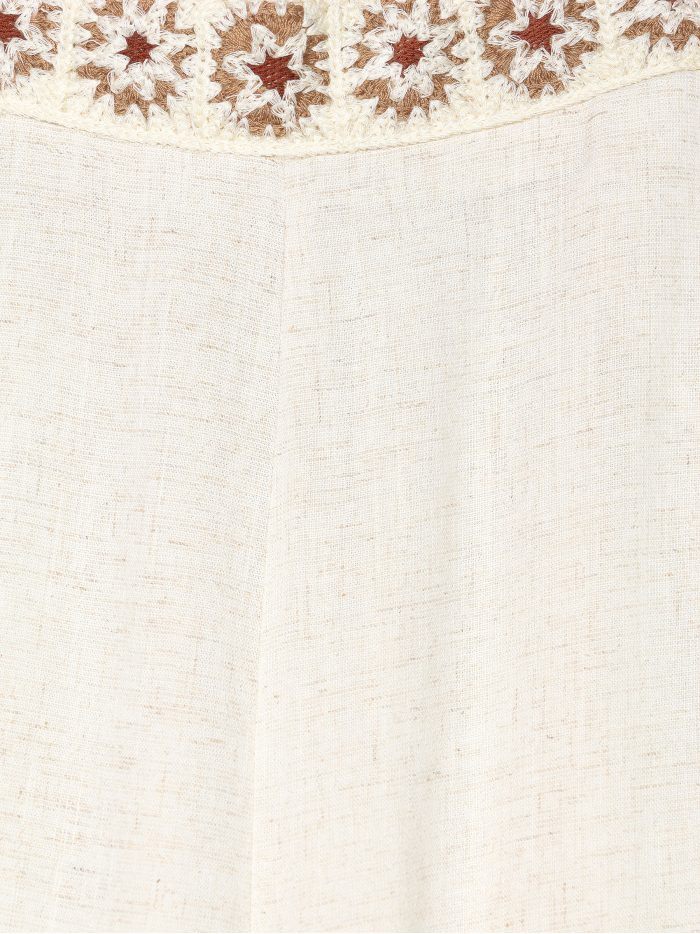 Pantalón efecto lino cenefa bordada