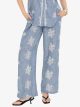 Pantaloni palazzo blu con ricami effetto lino