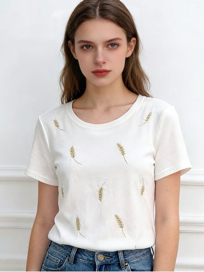 Camiseta bordada plumas