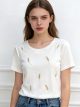 Camiseta bordada plumas