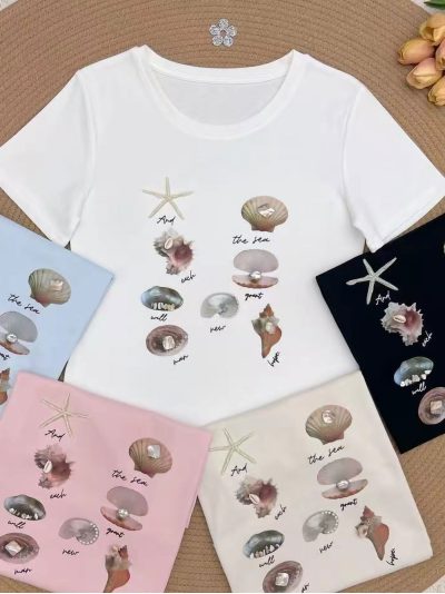 Camiseta print conchas marinas perlas