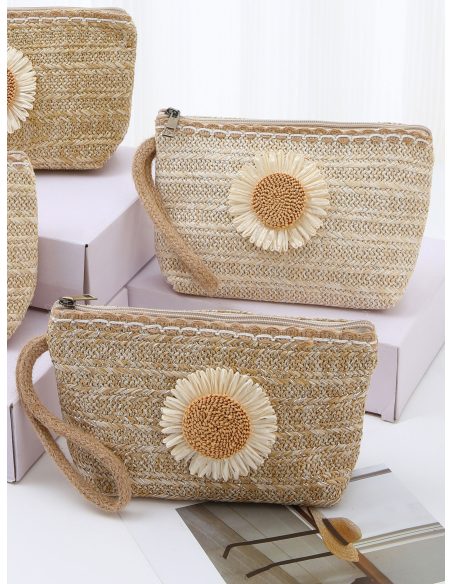 Nécessaire de higiene pessoal com efeito ráfia e estampa de margarida.