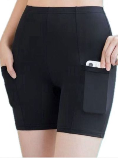 Legging corta deportiva con doble bolsillo