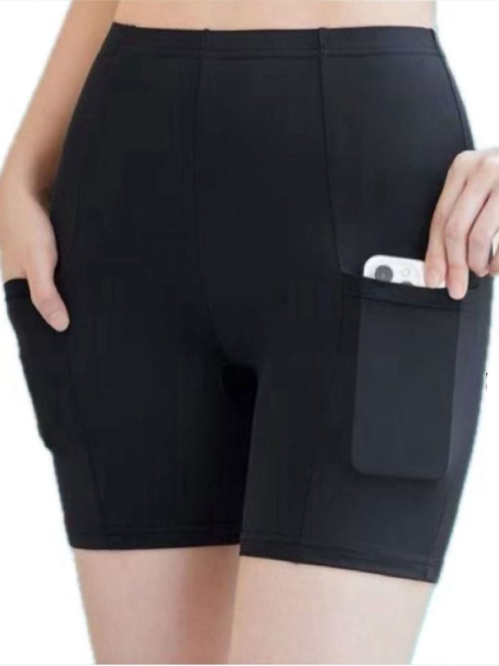 Legging corta deportiva con doble bolsillo