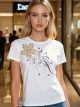 Camiseta flor de lentejuelas y strass