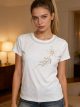 Camiseta cuello pedrería detalle flor