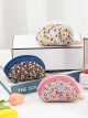 Monedero media luna estampado floral