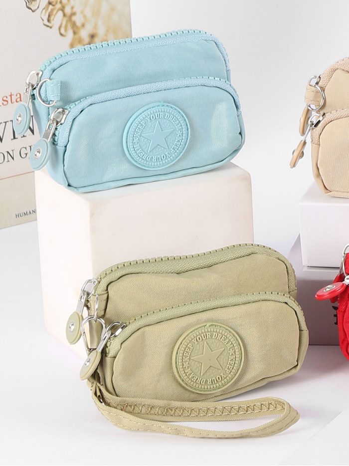 Portefeuille compact en tissu avec poche avant