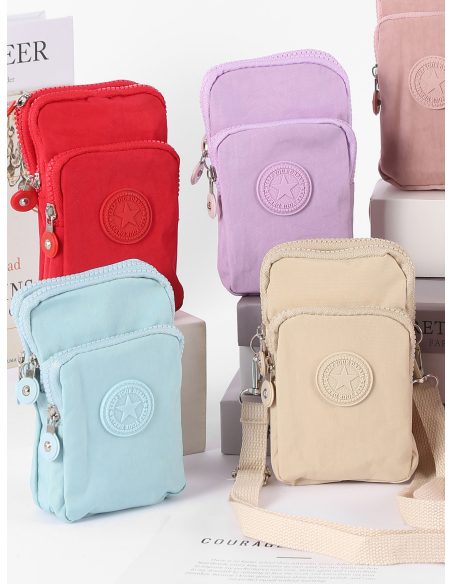 Mini bolsa de ombro em tecido para celular.