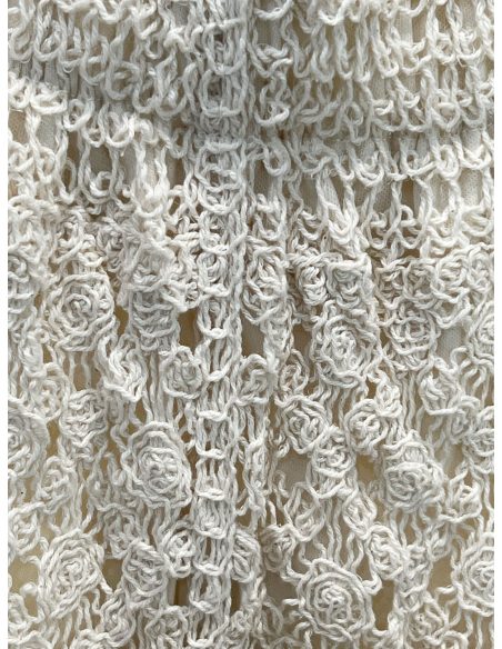 Pantaloni svasati traforati all'uncinetto