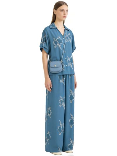 Completo camicia e pantaloni ricamati