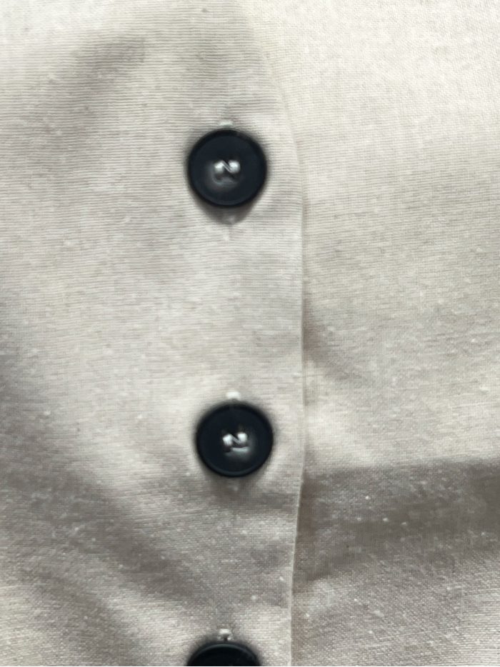 Chaleco sastre botones