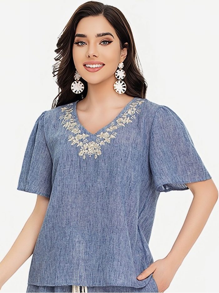 Blusa bordada manga acampanada