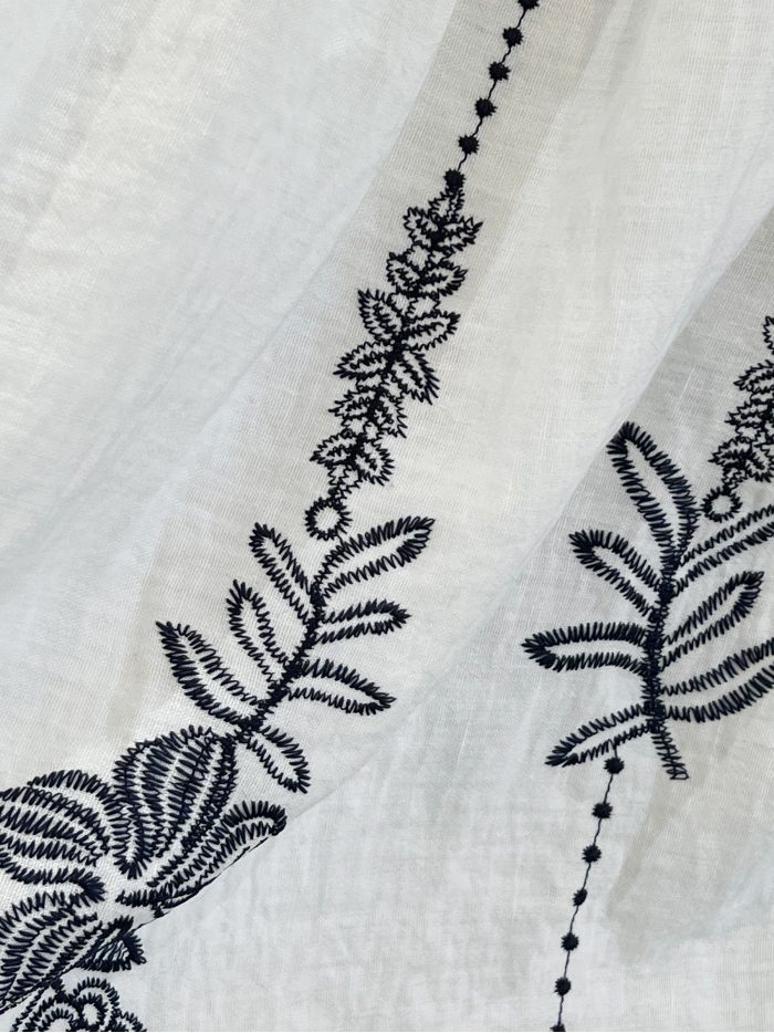 Falda larga bordada cintura nido