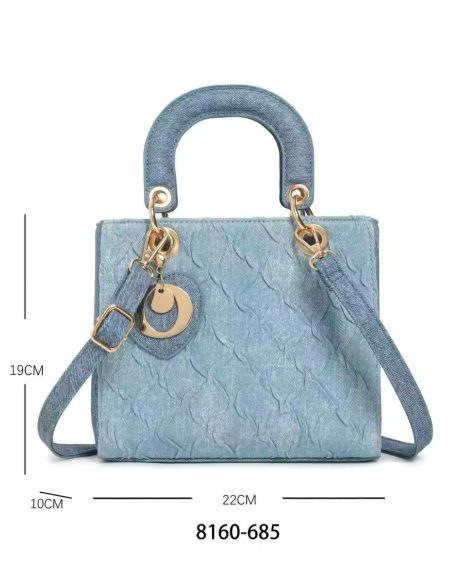 Bolso mini denim y colgante