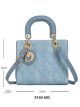 Bolso mini denim y colgante