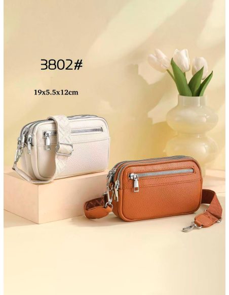 Kompakte Schultertasche mit drei Reißverschlüssen