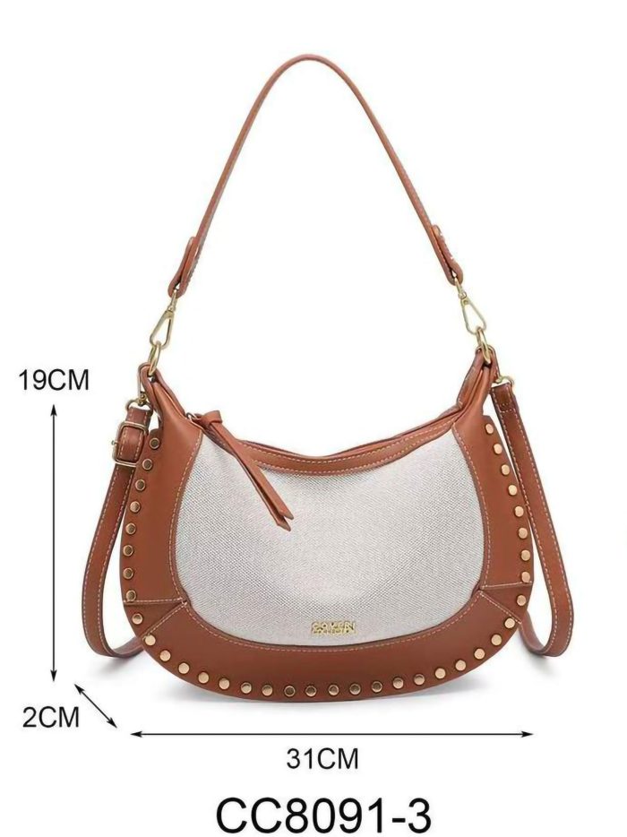 Bolso media luna de lona y tachuelas