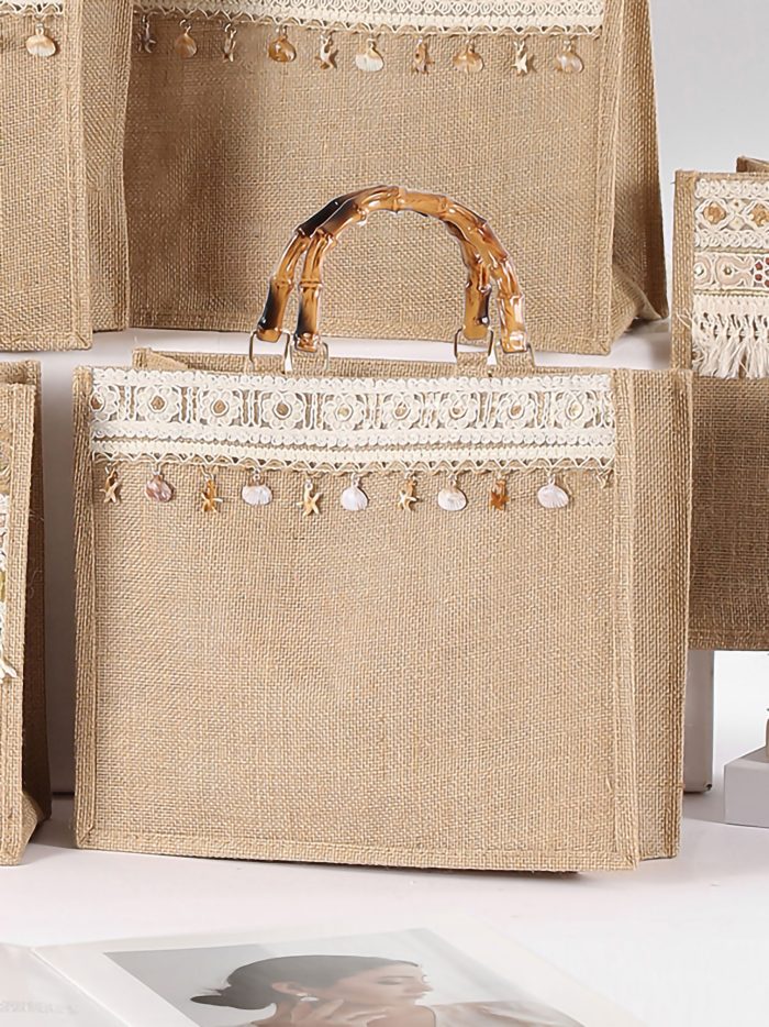 Borsa da spiaggia in iuta con manici in bambù e dettagli boho