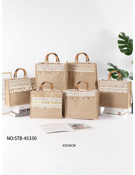 Borsa da spiaggia in iuta con manici in bambù e dettagli boho