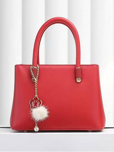 Mini bolso tote con colgante pompón