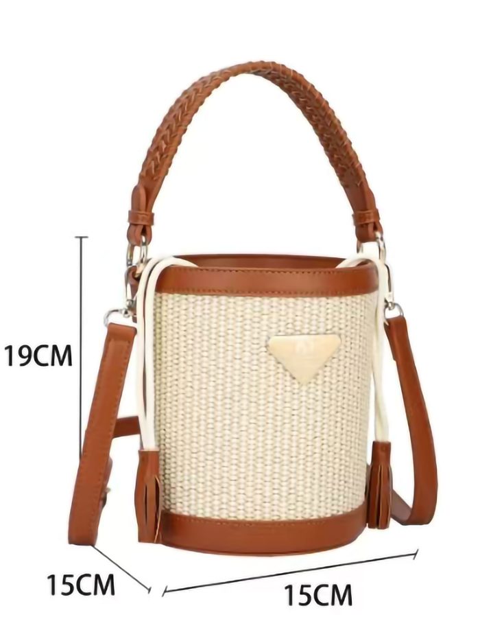 Raffia effect bucket bag with braided handle and tassels