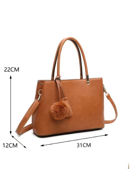 Bolso de mano detalle pompón