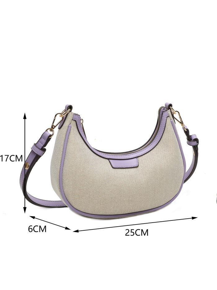 Bolso bandolera media luna de lona con ribete a contraste