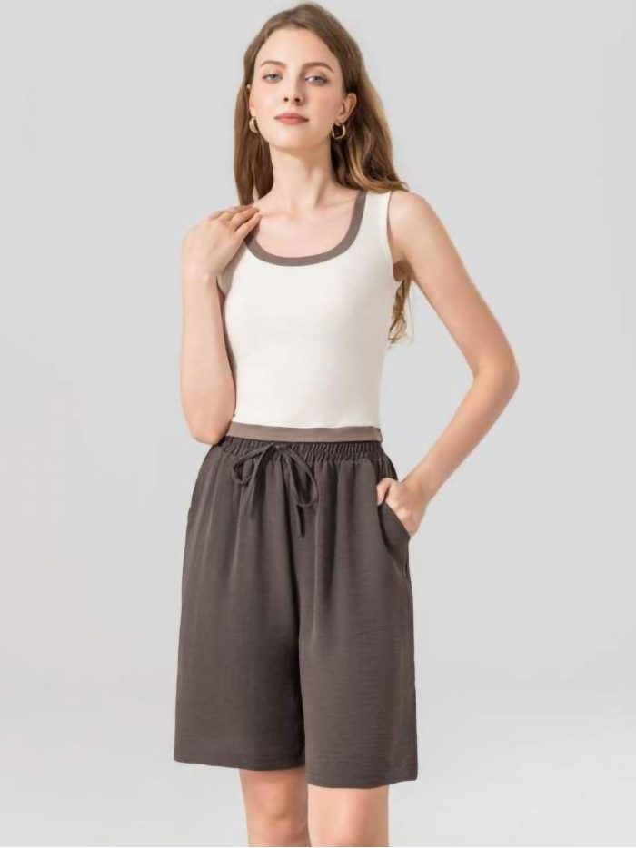 Top sin mangas ribete en contraste