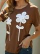 Camiseta aplicación floral en relieve
