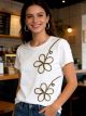 Camiseta com cadarço e bordado floral