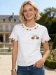 Camiseta cerezas bordadas detalle ribete