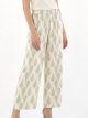 Pantalón efecto lino estampado hojas