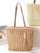 Bolso tote de rafia calada con borla y conchas