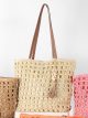 Bolso tote de rafia calada con borla y conchas